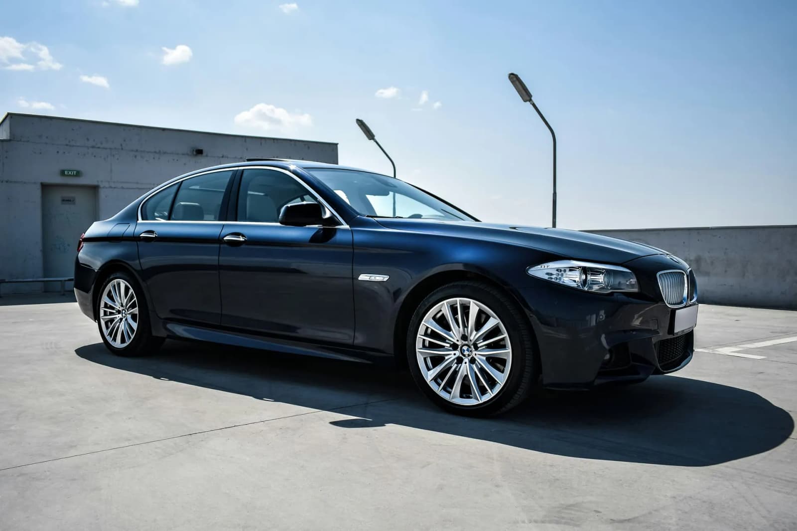 Clean modern sedan on an open road